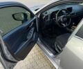 Сірий Мазда 3, об'ємом двигуна 2 л та пробігом 150 тис. км за 12500 $, фото 4 на Automoto.ua