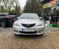 Серый Мазда 3, объемом двигателя 2 л и пробегом 242 тыс. км за 3400 $, фото 1 на Automoto.ua