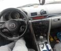 Сірий Мазда 3, об'ємом двигуна 1.6 л та пробігом 245 тис. км за 4401 $, фото 1 на Automoto.ua
