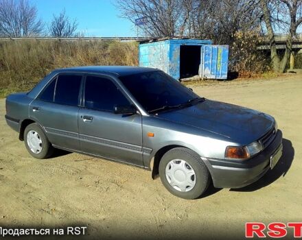 Серый Мазда 3, объемом двигателя 1.6 л и пробегом 205 тыс. км за 1500 $, фото 1 на Automoto.ua