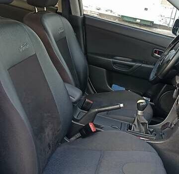 Серый Мазда 3, объемом двигателя 2 л и пробегом 345 тыс. км за 4150 $, фото 1 на Automoto.ua