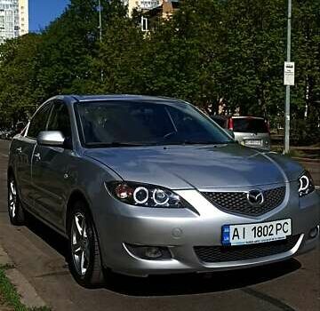 Серый Мазда 3, объемом двигателя 2 л и пробегом 345 тыс. км за 4150 $, фото 2 на Automoto.ua