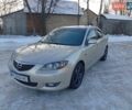 Серый Мазда 3, объемом двигателя 1.6 л и пробегом 245 тыс. км за 3000 $, фото 1 на Automoto.ua
