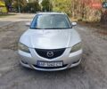 Серый Мазда 3, объемом двигателя 2 л и пробегом 250 тыс. км за 3600 $, фото 1 на Automoto.ua