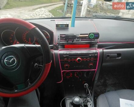 Сірий Мазда 3, об'ємом двигуна 1.56 л та пробігом 354 тис. км за 5500 $, фото 10 на Automoto.ua