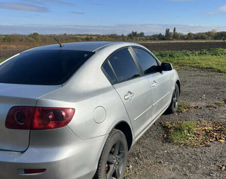 Серый Мазда 3, объемом двигателя 1.56 л и пробегом 335 тыс. км за 3300 $, фото 2 на Automoto.ua