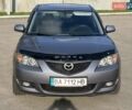 Серый Мазда 3, объемом двигателя 1.6 л и пробегом 180 тыс. км за 5599 $, фото 1 на Automoto.ua