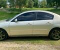 Серый Мазда 3, объемом двигателя 1.6 л и пробегом 300 тыс. км за 4200 $, фото 3 на Automoto.ua