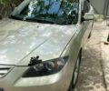 Серый Мазда 3, объемом двигателя 1.6 л и пробегом 258 тыс. км за 4000 $, фото 1 на Automoto.ua
