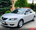 Серый Мазда 3, объемом двигателя 1.6 л и пробегом 250 тыс. км за 4500 $, фото 1 на Automoto.ua