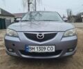 Серый Мазда 3, объемом двигателя 1.61 л и пробегом 219 тыс. км за 3100 $, фото 1 на Automoto.ua