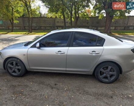 Серый Мазда 3, объемом двигателя 2 л и пробегом 250 тыс. км за 3600 $, фото 1 на Automoto.ua