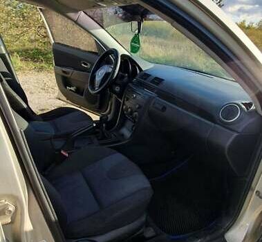 Мазда 3 2004 в Калуше на Automoto.ua Серый Мазда 3, объемом двигателя 1.6 л и пробегом 244 тыс. км за 2900 $, фото 25 на Automoto.ua