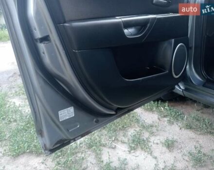 Серый Мазда 3, объемом двигателя 2.3 л и пробегом 165 тыс. км за 4600 $, фото 2 на Automoto.ua