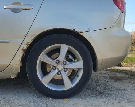 Мазда 3 2004 в Калуше на Automoto.ua Серый Мазда 3, объемом двигателя 1.6 л и пробегом 244 тыс. км за 2900 $, фото 13 на Automoto.ua
