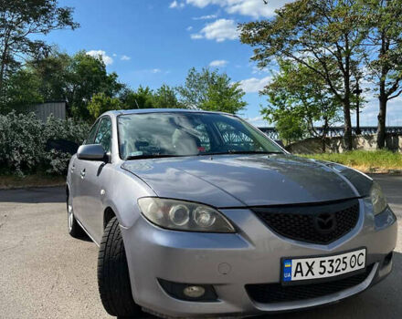 Серый Мазда 3, объемом двигателя 2 л и пробегом 330 тыс. км за 4000 $, фото 3 на Automoto.ua