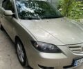 Серый Мазда 3, объемом двигателя 1.6 л и пробегом 258 тыс. км за 4000 $, фото 1 на Automoto.ua
