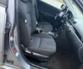 Серый Мазда 3, объемом двигателя 1.6 л и пробегом 220 тыс. км за 3650 $, фото 12 на Automoto.ua