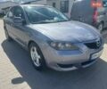 Серый Мазда 3, объемом двигателя 1.6 л и пробегом 370 тыс. км за 3000 $, фото 1 на Automoto.ua
