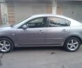 Сірий Мазда 3, об'ємом двигуна 1.6 л та пробігом 240 тис. км за 4400 $, фото 1 на Automoto.ua
