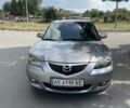 Серый Мазда 3, объемом двигателя 1.6 л и пробегом 230 тыс. км за 3900 $, фото 1 на Automoto.ua