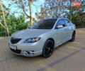 Серый Мазда 3, объемом двигателя 2 л и пробегом 333 тыс. км за 4650 $, фото 1 на Automoto.ua