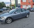 Серый Мазда 3, объемом двигателя 2 л и пробегом 350 тыс. км за 3450 $, фото 1 на Automoto.ua