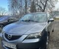 Серый Мазда 3, объемом двигателя 1.6 л и пробегом 189 тыс. км за 3350 $, фото 1 на Automoto.ua