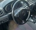Серый Мазда 3, объемом двигателя 2.3 л и пробегом 165 тыс. км за 4600 $, фото 3 на Automoto.ua