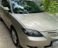 Серый Мазда 3, объемом двигателя 1.6 л и пробегом 258 тыс. км за 5000 $, фото 1 на Automoto.ua