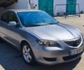 Серый Мазда 3, объемом двигателя 2 л и пробегом 190 тыс. км за 3500 $, фото 1 на Automoto.ua