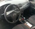 Сірий Мазда 3, об'ємом двигуна 1.6 л та пробігом 244 тис. км за 4250 $, фото 5 на Automoto.ua