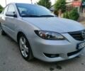 Серый Мазда 3, объемом двигателя 2.26 л и пробегом 180 тыс. км за 1999 $, фото 1 на Automoto.ua