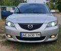 Серый Мазда 3, объемом двигателя 1.56 л и пробегом 250 тыс. км за 3900 $, фото 1 на Automoto.ua