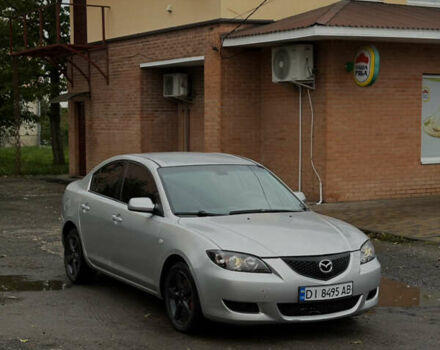 Серый Мазда 3, объемом двигателя 2 л и пробегом 229 тыс. км за 4000 $, фото 2 на Automoto.ua