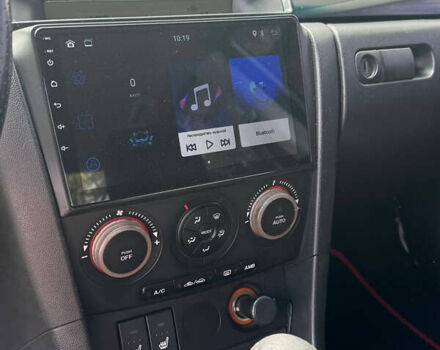 Сірий Мазда 3, об'ємом двигуна 1.6 л та пробігом 245 тис. км за 4300 $, фото 10 на Automoto.ua