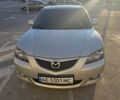 Серый Мазда 3, объемом двигателя 2 л и пробегом 334 тыс. км за 3800 $, фото 1 на Automoto.ua