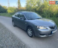 Серый Мазда 3, объемом двигателя 1.6 л и пробегом 302 тыс. км за 3400 $, фото 1 на Automoto.ua