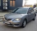 Серый Мазда 3, объемом двигателя 1.6 л и пробегом 300 тыс. км за 3207 $, фото 1 на Automoto.ua