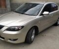 Серый Мазда 3, объемом двигателя 2 л и пробегом 210 тыс. км за 4100 $, фото 1 на Automoto.ua