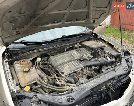 Сірий Мазда 3, об'ємом двигуна 1.6 л та пробігом 301 тис. км за 2750 $, фото 28 на Automoto.ua
