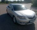 Серый Мазда 3, объемом двигателя 1.6 л и пробегом 238 тыс. км за 5400 $, фото 1 на Automoto.ua