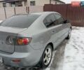 Сірий Мазда 3, об'ємом двигуна 1.6 л та пробігом 297 тис. км за 4399 $, фото 9 на Automoto.ua