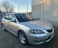 Сірий Мазда 3, об'ємом двигуна 1.6 л та пробігом 310 тис. км за 5300 $, фото 1 на Automoto.ua
