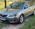 Серый Мазда 3, объемом двигателя 1.6 л и пробегом 310 тыс. км за 4150 $, фото 1 на Automoto.ua