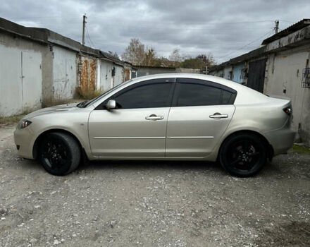 Сірий Мазда 3, об'ємом двигуна 2 л та пробігом 323 тис. км за 4600 $, фото 2 на Automoto.ua