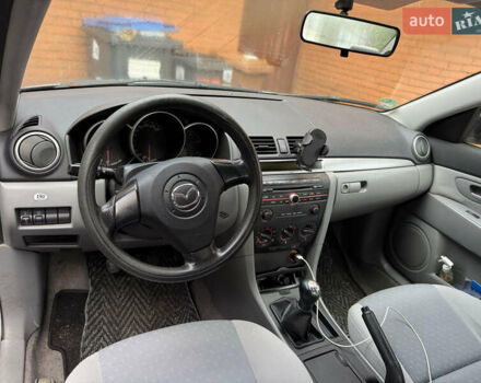 Сірий Мазда 3, об'ємом двигуна 1.6 л та пробігом 187 тис. км за 3950 $, фото 9 на Automoto.ua