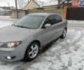 Сірий Мазда 3, об'ємом двигуна 1.6 л та пробігом 297 тис. км за 4399 $, фото 1 на Automoto.ua