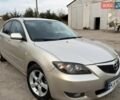 Серый Мазда 3, объемом двигателя 1.6 л и пробегом 213 тыс. км за 4599 $, фото 1 на Automoto.ua