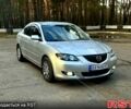 Сірий Мазда 3, об'ємом двигуна 1.6 л та пробігом 299 тис. км за 3999 $, фото 1 на Automoto.ua